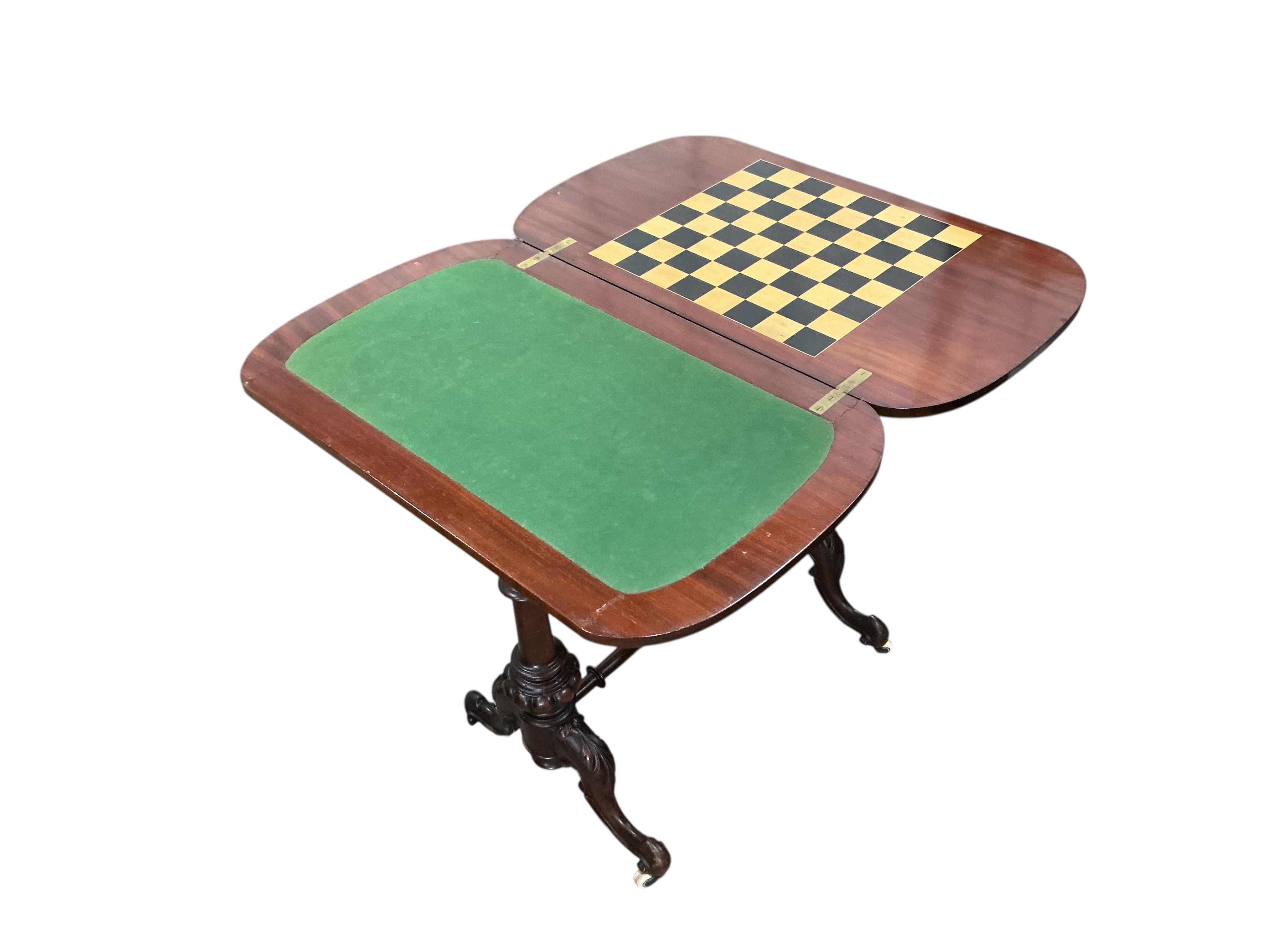 A Victorian walnut games / work table, width 70cm, depth 42cm, height 74cm